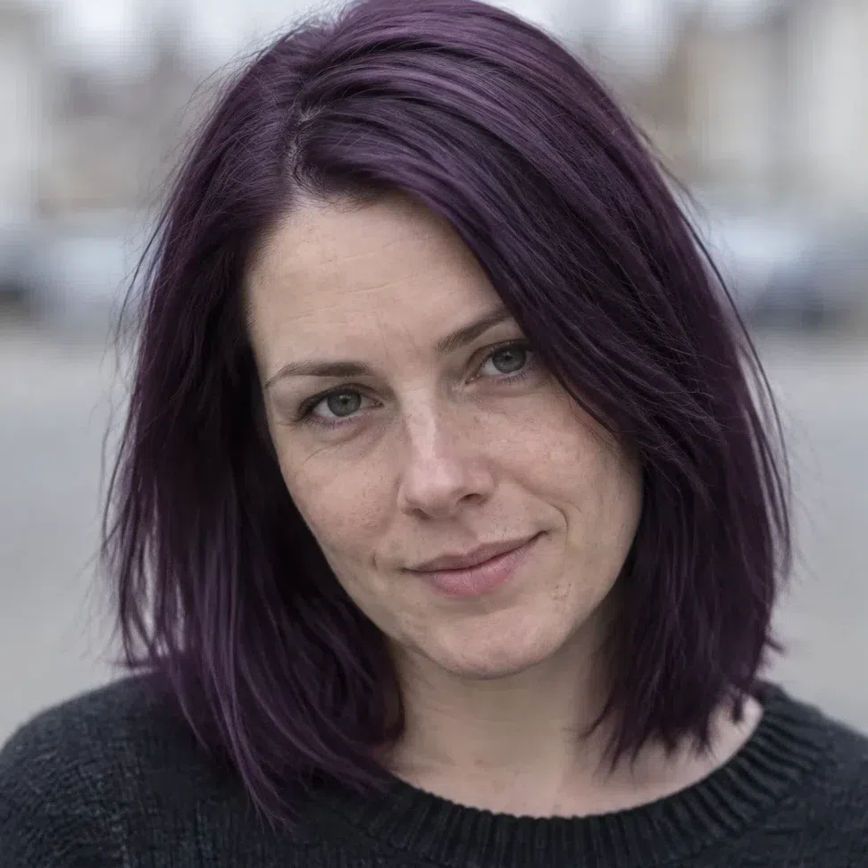 Bright eggplant hair color on a Cool Summer woman