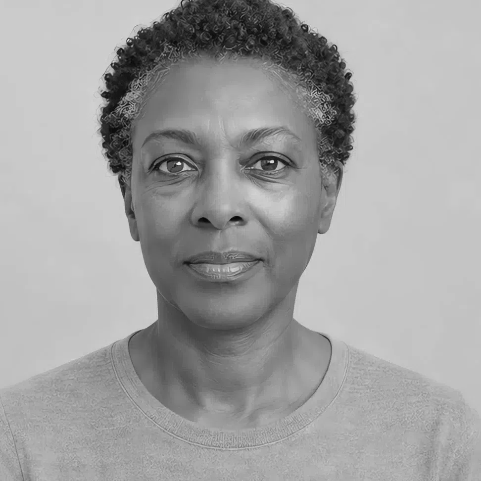 Grayscale portrait of a deep-complexion Light Summer - hair only a step from the skin