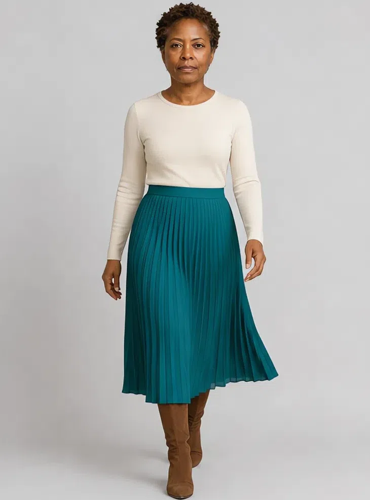 Teal pleated midi skirt with a cream top, Deep complexion