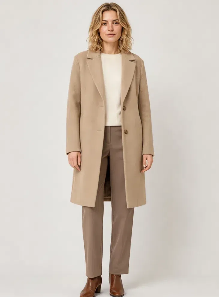 Sand wool coat over a cream knit and mushroom trousers, Fair complexion