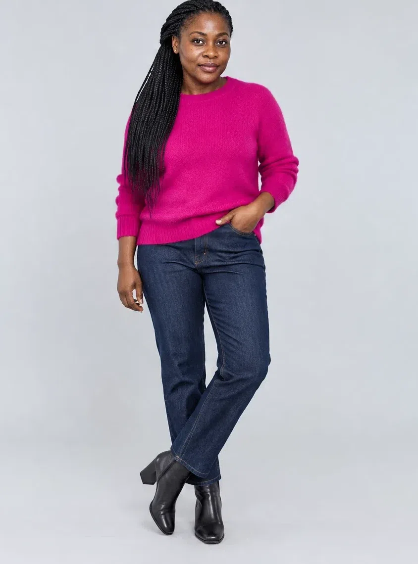 Shocking pink mohair sweater shown on four Bright Winter complexions, Deep complexion