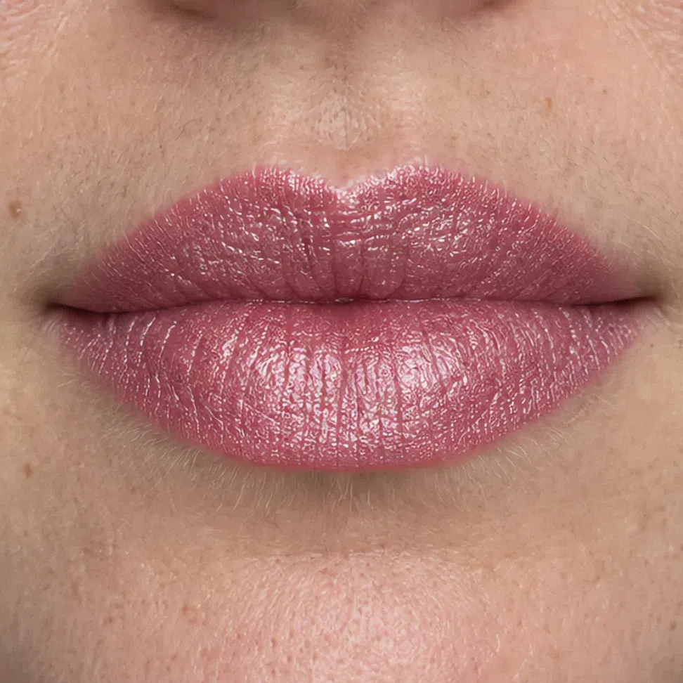 The same lipstick as a dense frost, pearl packed tightly enough to lighten the shade
