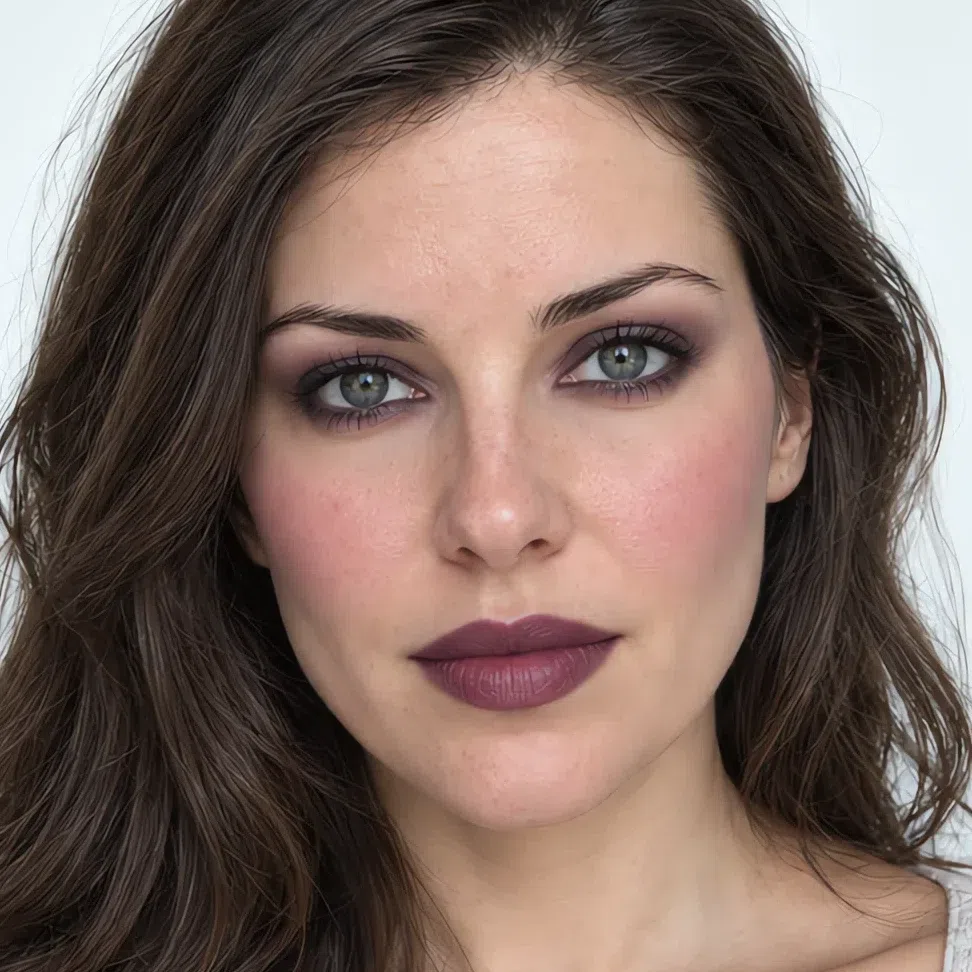 A Cool Summer face wearing full evening makeup with a violet brown smoke and a plum lip