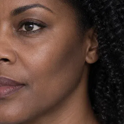 Cocoa taupe contour on a deep Deep Winter complexion