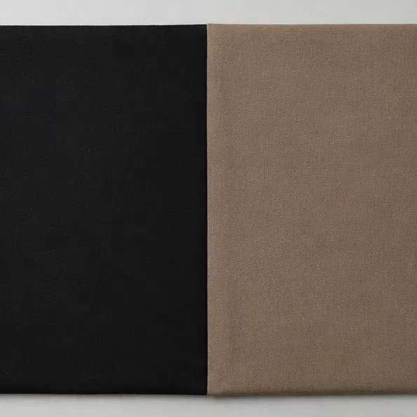 A true black fabric square beside a soft gray-brown one