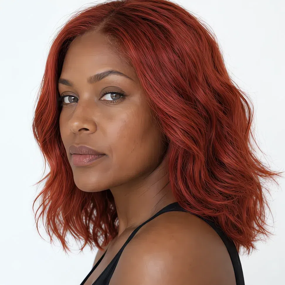 A Light Summer woman with deep brown skin and a bright clear red at level 8