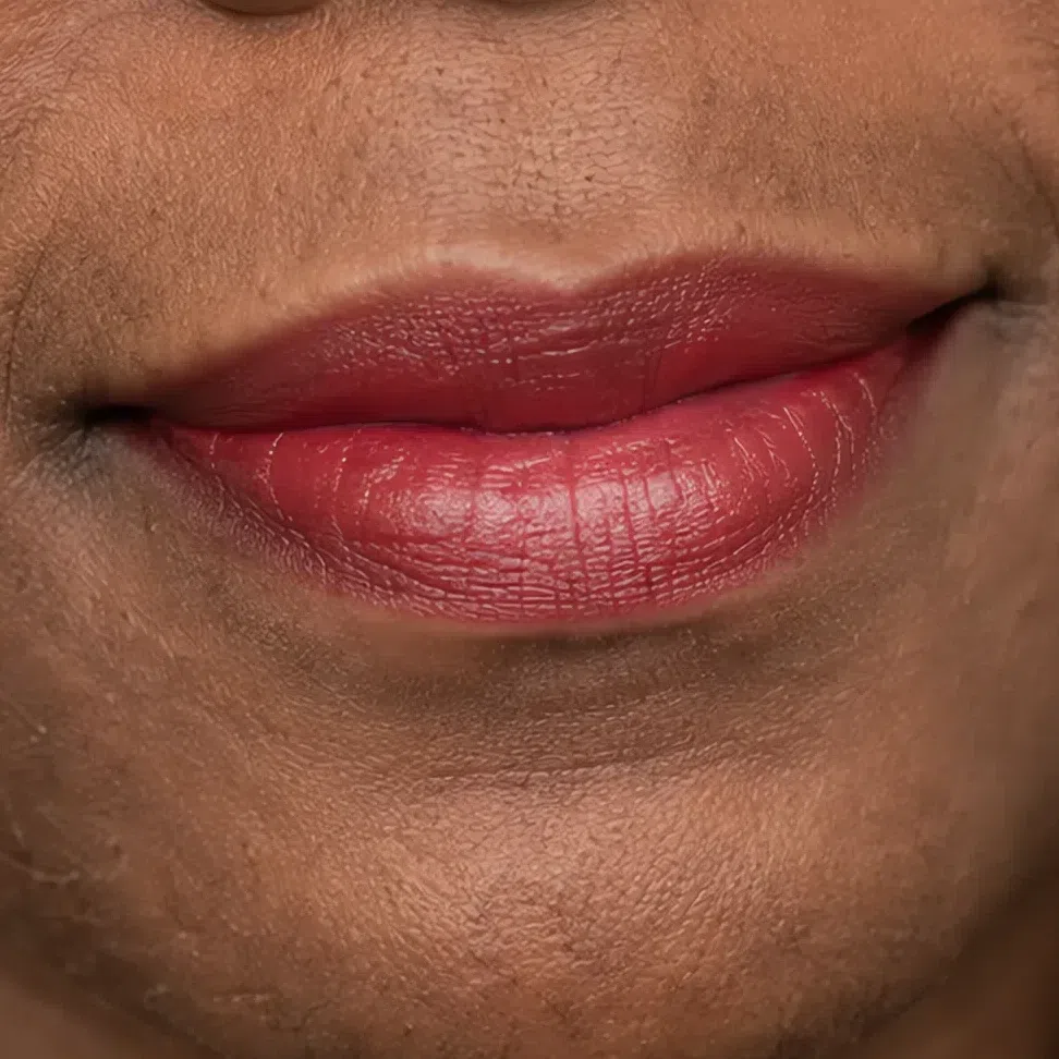 Light Summer evening lip makeup on a deep complexion