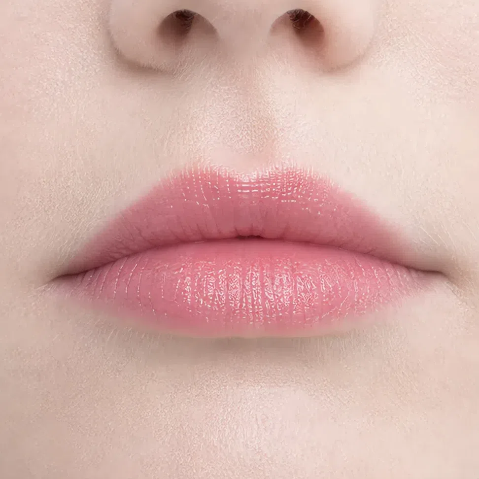 Light Summer evening lip makeup on a fair complexion