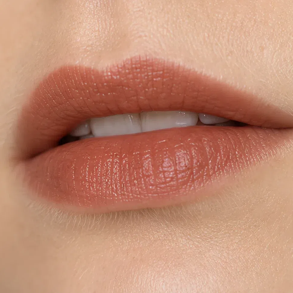 Soft Autumn evening lip color on a fair complexion