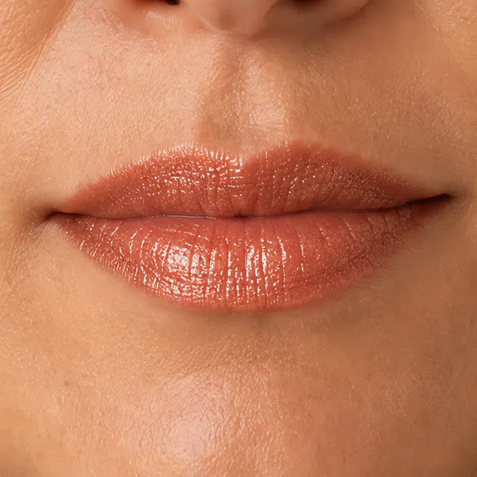 The same lipstick in a shimmer finish with fine warm reflective particles