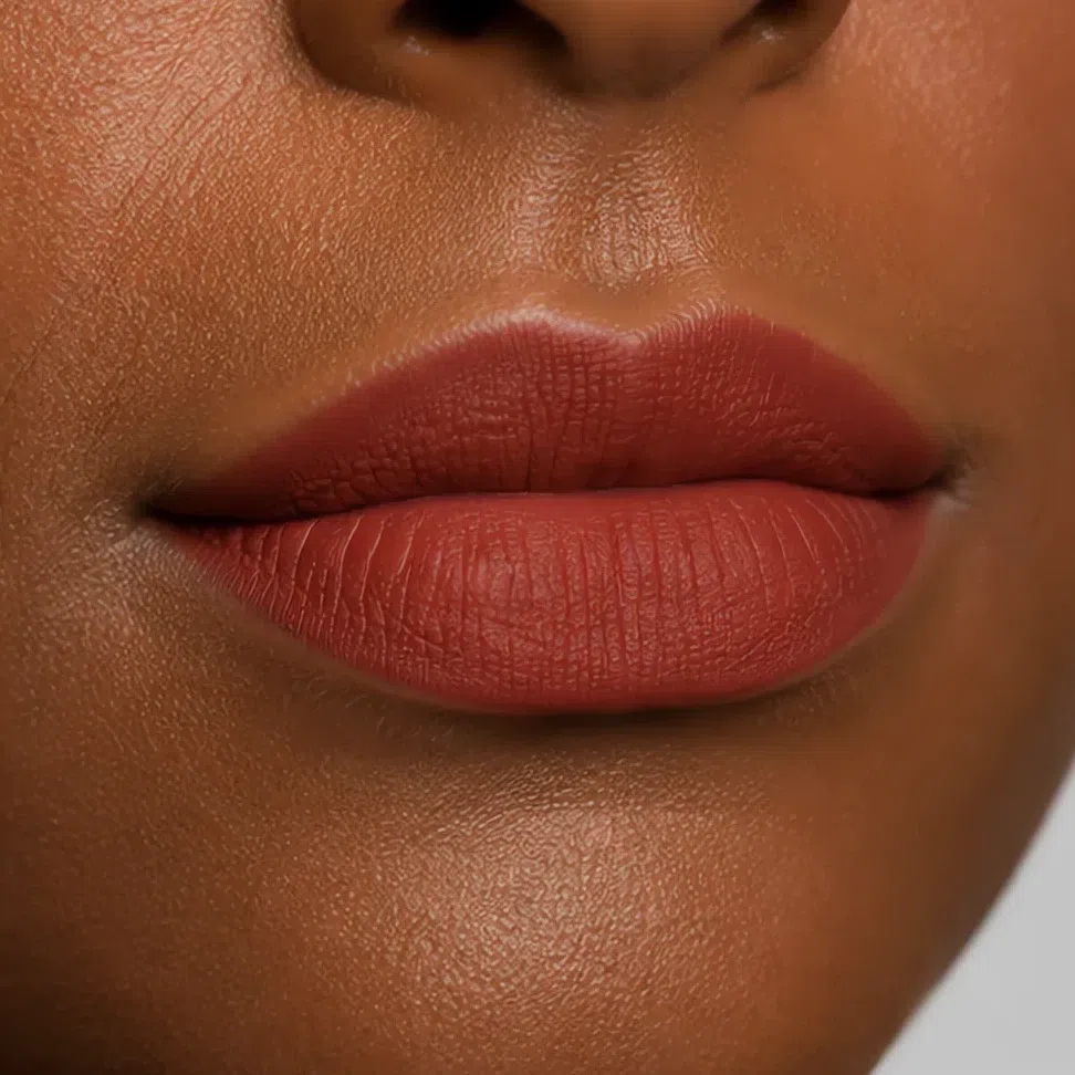 Paprika lipstick on deep warm brown skin, Soft Autumn