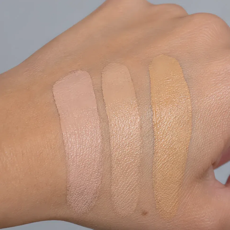 The same three shades swatched on the back of the hand where all three look fine