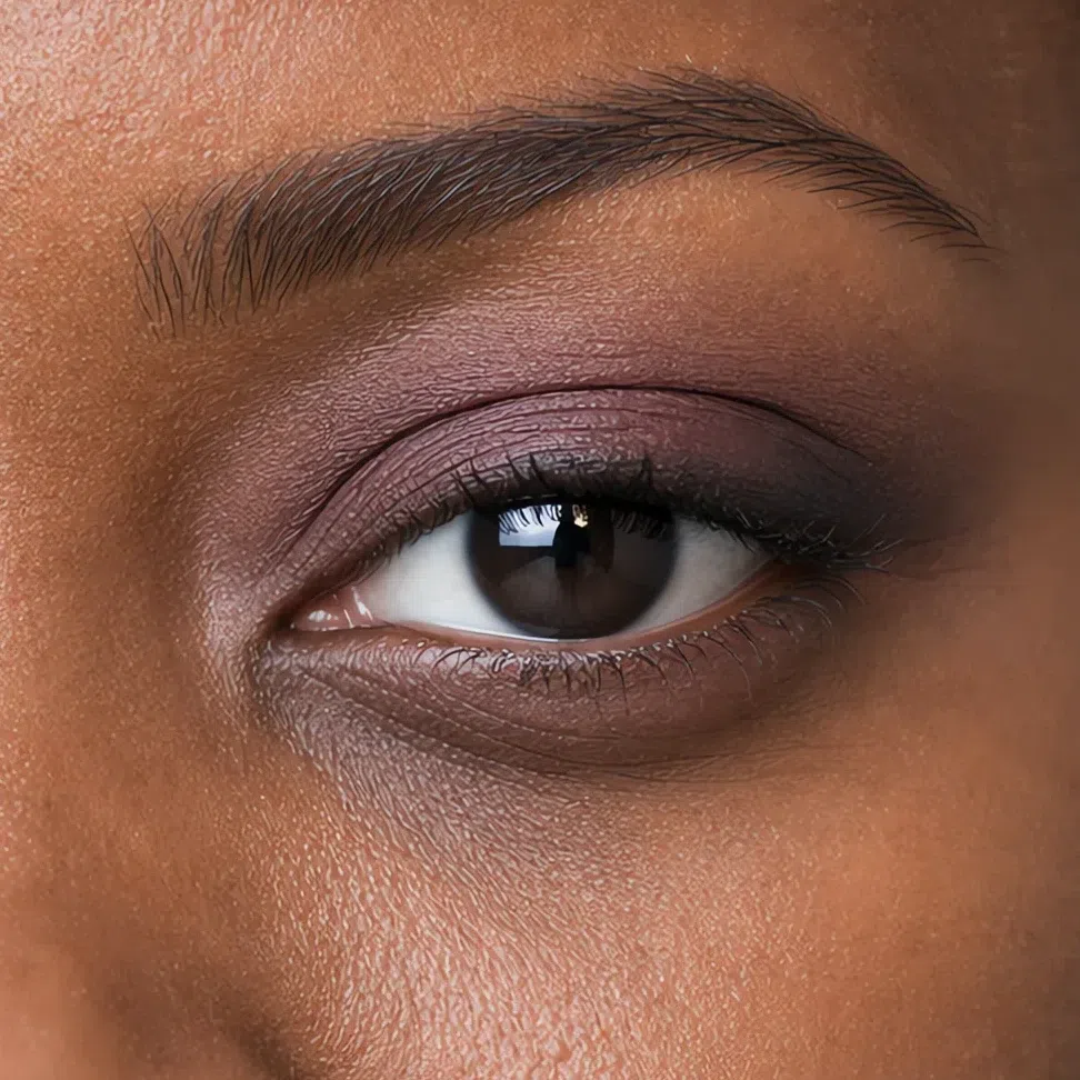 Soft Summer daytime eye makeup on a deep complexion