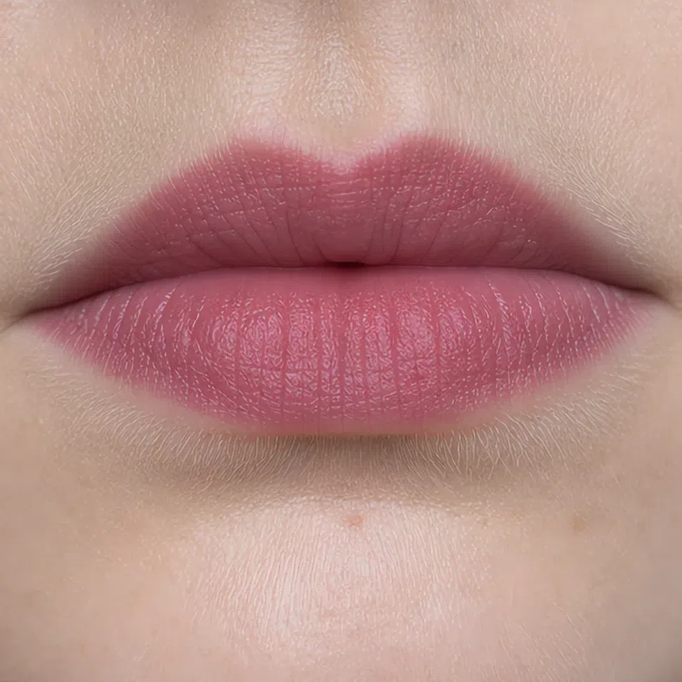 Soft Summer evening lip makeup on a fair complexion