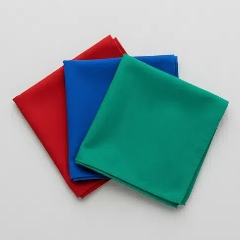 Clean scarlet, cobalt and emerald fabric squares