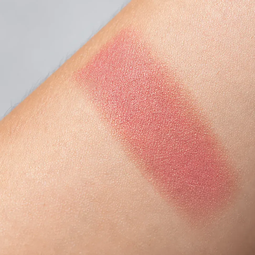 The same swatch under bright flat studio light, looking cleaner than it is