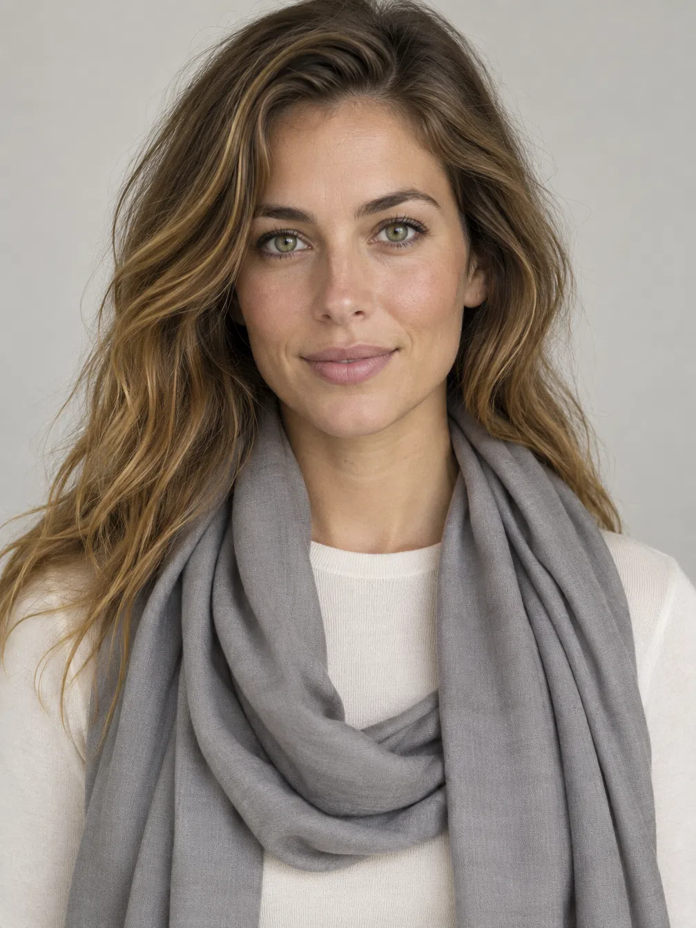 One Warm Spring accent painted onto the draped scarf, the knit beneath it left near-ivory in Grapefruit