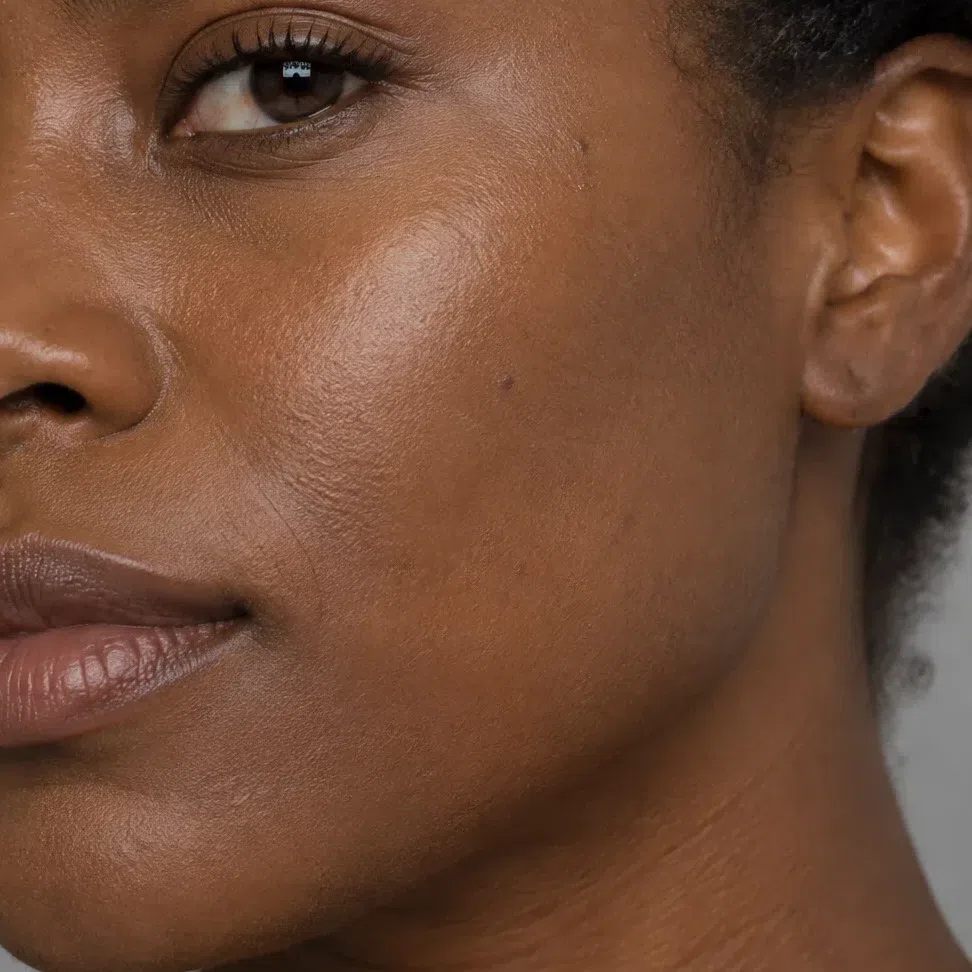 Warm caramel foundation on a deep Warm Spring complexion