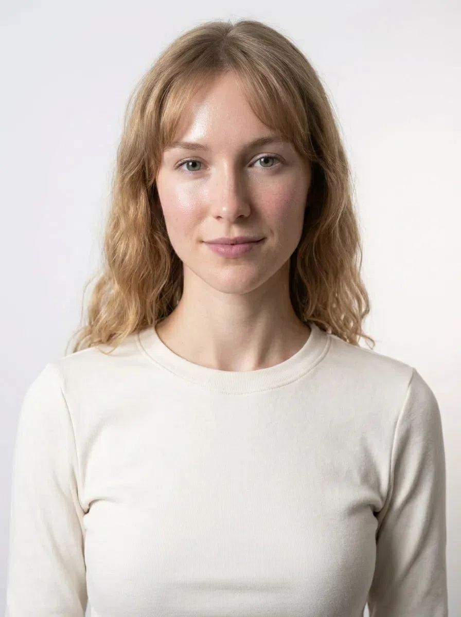 A Soft Summer model, with the color of her top changed to try palette shades
