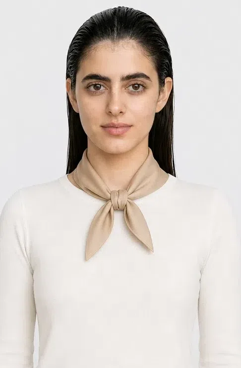 A small silk kerchief knotted at the throat, repainted in Deep Autumn pairings