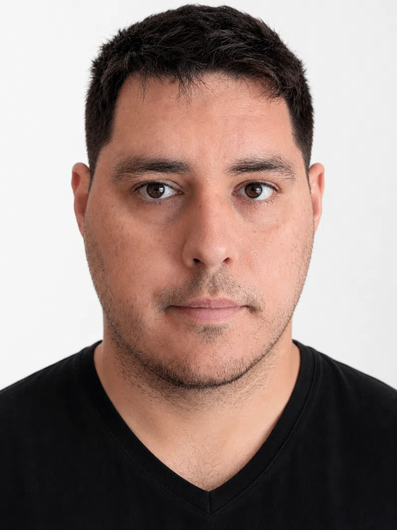 Front-view face analysis of a man: symmetry and proportion markup before the analysis