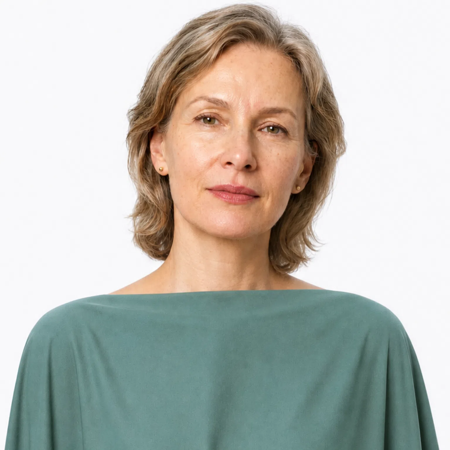 Muted coloring - a model in a dusty teal drape